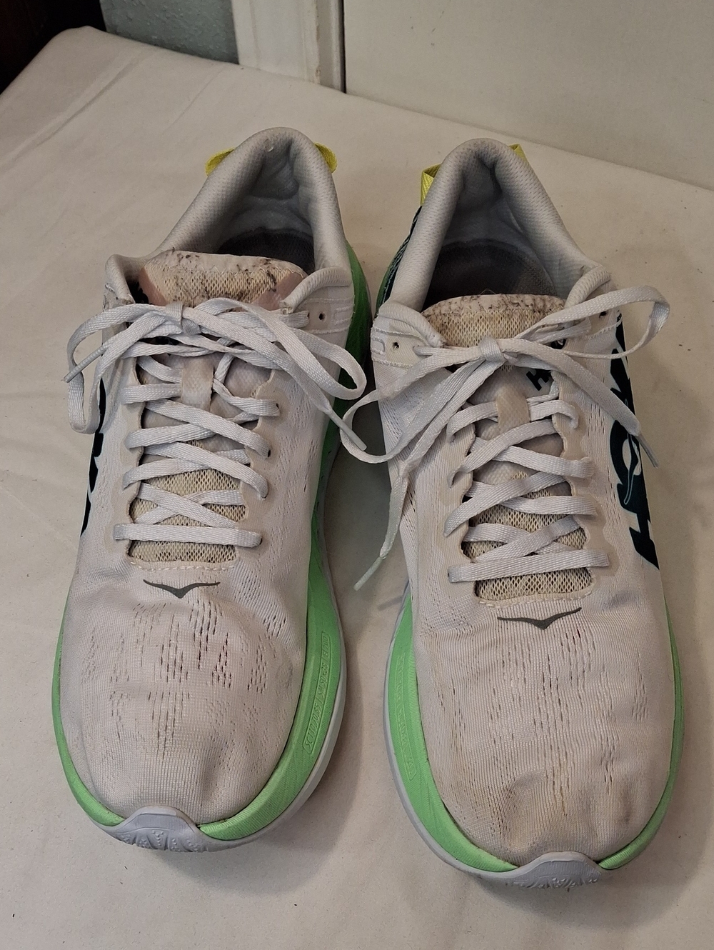 Hoka One One M Carbon X White Sneakers with Light Green Midsoles.